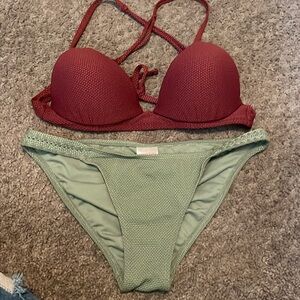Maroon and sage green bathing suit.